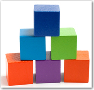 Building blocks stacked in a pyramid