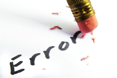 A picture of a pencil erasing the word 'error'.