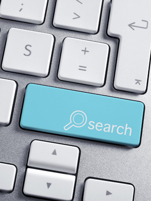 A picture of a search button on a computer keyboard.