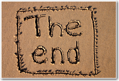 The words "the end" written in the sand.