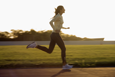 A picture of someone running on a track.