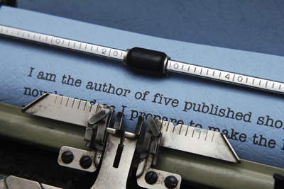 A picture of a story being typed with a typewriter.