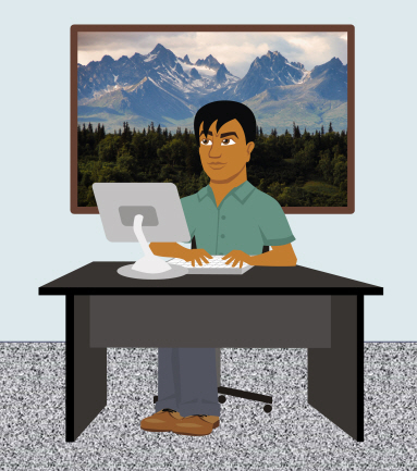 a man typing on his computer