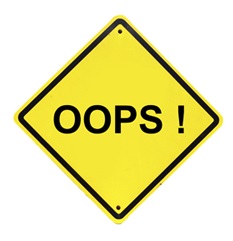 A picture of a road sign with the word "oops" on it.